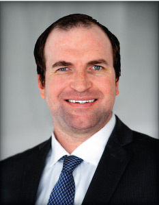Patrick McNulty appears in a website headshot for Patrick Farber Structured Settlements.